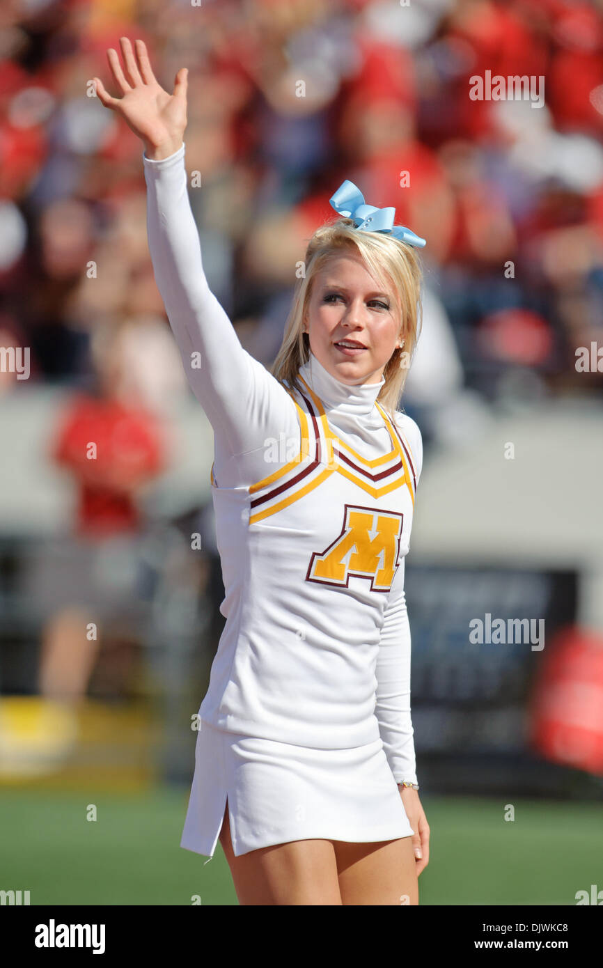 Oct. 09, 2010 - Madison, Wisconsin, United States of America - a Minnesota cheerleader performs during the game between the Minnesota Golden Gophers and the Wisconsin Badgers at Camp Randall Stadium, Madison, Wisconsin.  Wisconsin defeated Minnesota 41-23. (Credit Image: © John Rowland/Southcreek Global/ZUMApress.com) Stock Photo