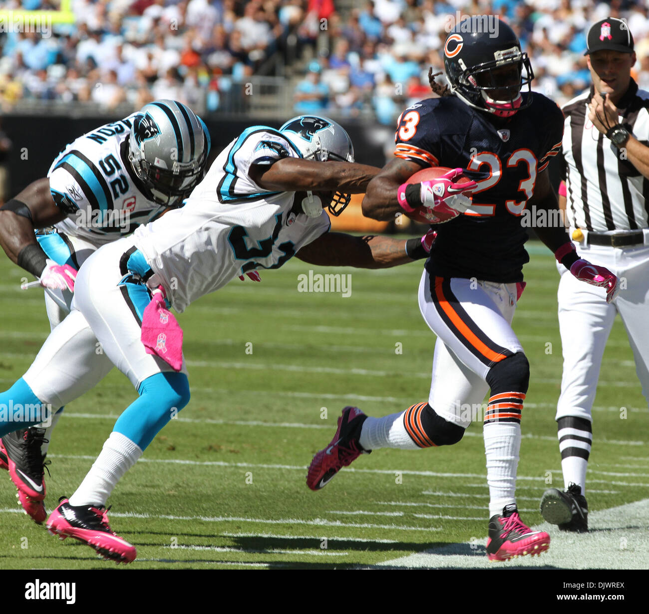 Oct. 10, 2010 - Charlotte, North Carolina, United States of America - Chicago Bears wide receiver Devin Hester (23) runs a punt return back to the Carolina Panther 20 yard line, setting up the Bears' second touchdown. The Bears lead the Panthers 17-3 at the half in the game at Bank of America Stadium. (Credit Image: © Margaret Bowles/Southcreek Global/ZUMApress.com) Stock Photo