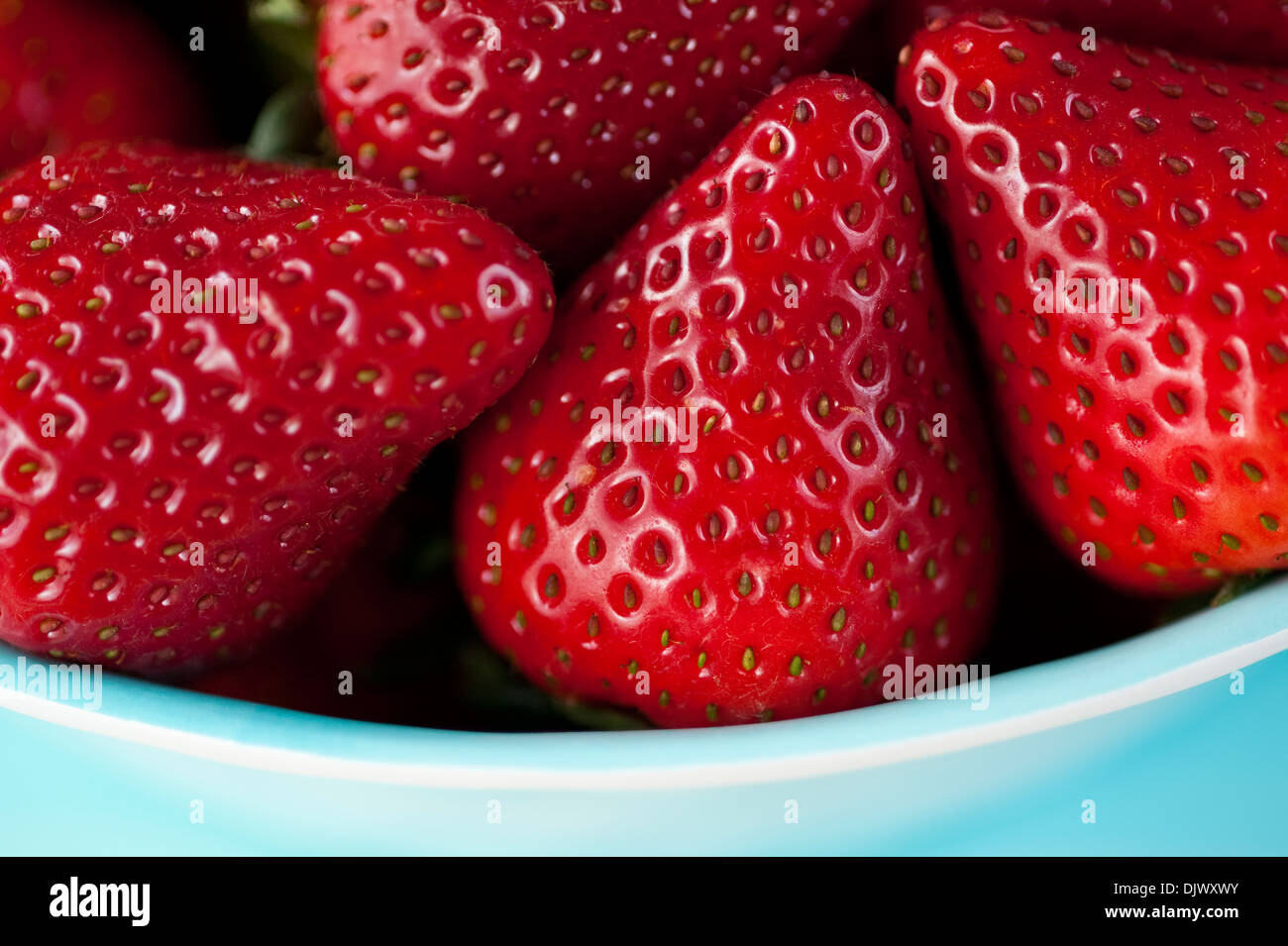 Ripe strawberries in a bowl on counter Stock Photo - Alamy