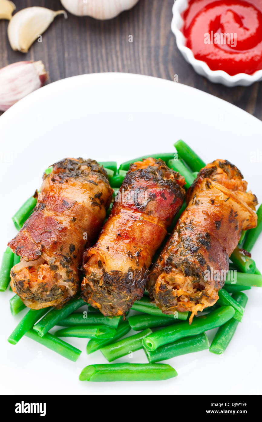 Bacon wrapped cutlet Stock Photo