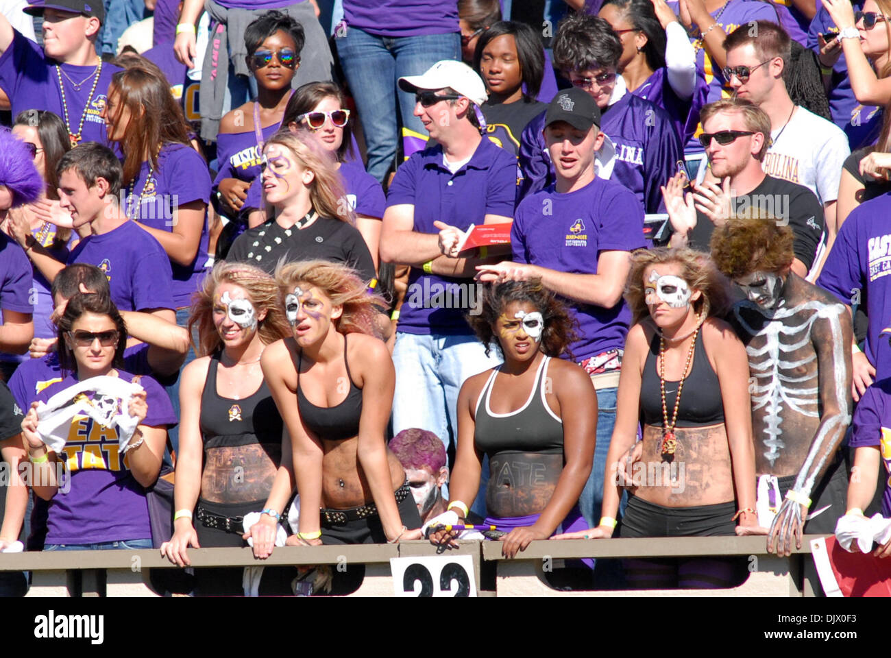 Oct. 16, 2010 - Greenville, North Carolina, United States of America - ECU  fans cheer their team during the game between the East Carolina Pirates and  the NC State Wolfpack at Dowdy-Ficklen