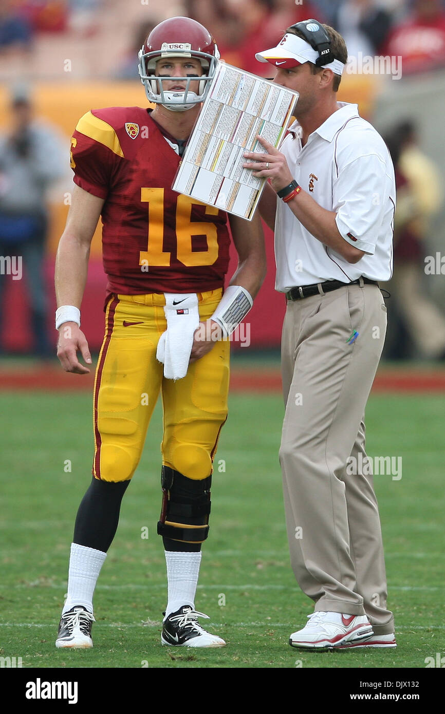 Oct. 16, 2010 - Los Angeles, California, United States of America - USC Trojans quarterback Mitch Mustain #16 (L) gets orders from USC head coach Lane Kiffin (R) during the USC Trojans vs California Golden Bears game at the Los Angeles Memorial Coliseum. The Trojans went on to defeat the Golden Bears with a final score of 48-14. (Credit Image: © Brandon Parry/Southcreek Global/ZUMA Stock Photo