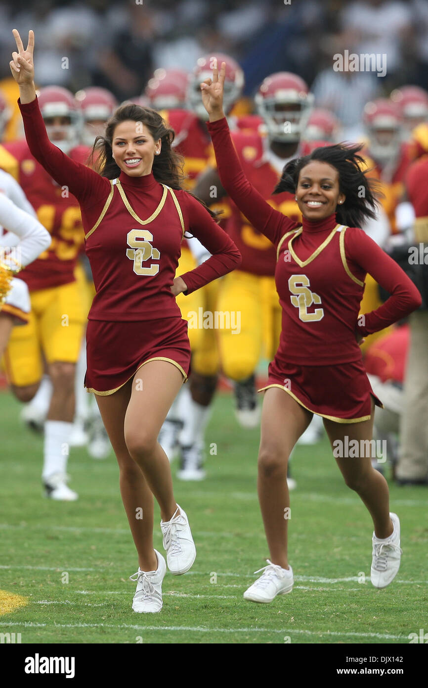 Oct. 16, 2010 - Los Angeles, California, United States of America - USC cheerleaders run out on to the field before the start of the USC Trojans vs California Golden Bears game at the Los Angeles Memorial Coliseum. The Trojans went on to defeat the Golden Bears with a final score of 48-14. (Credit Image: © Brandon Parry/Southcreek Global/ZUMApress.com) Stock Photo
