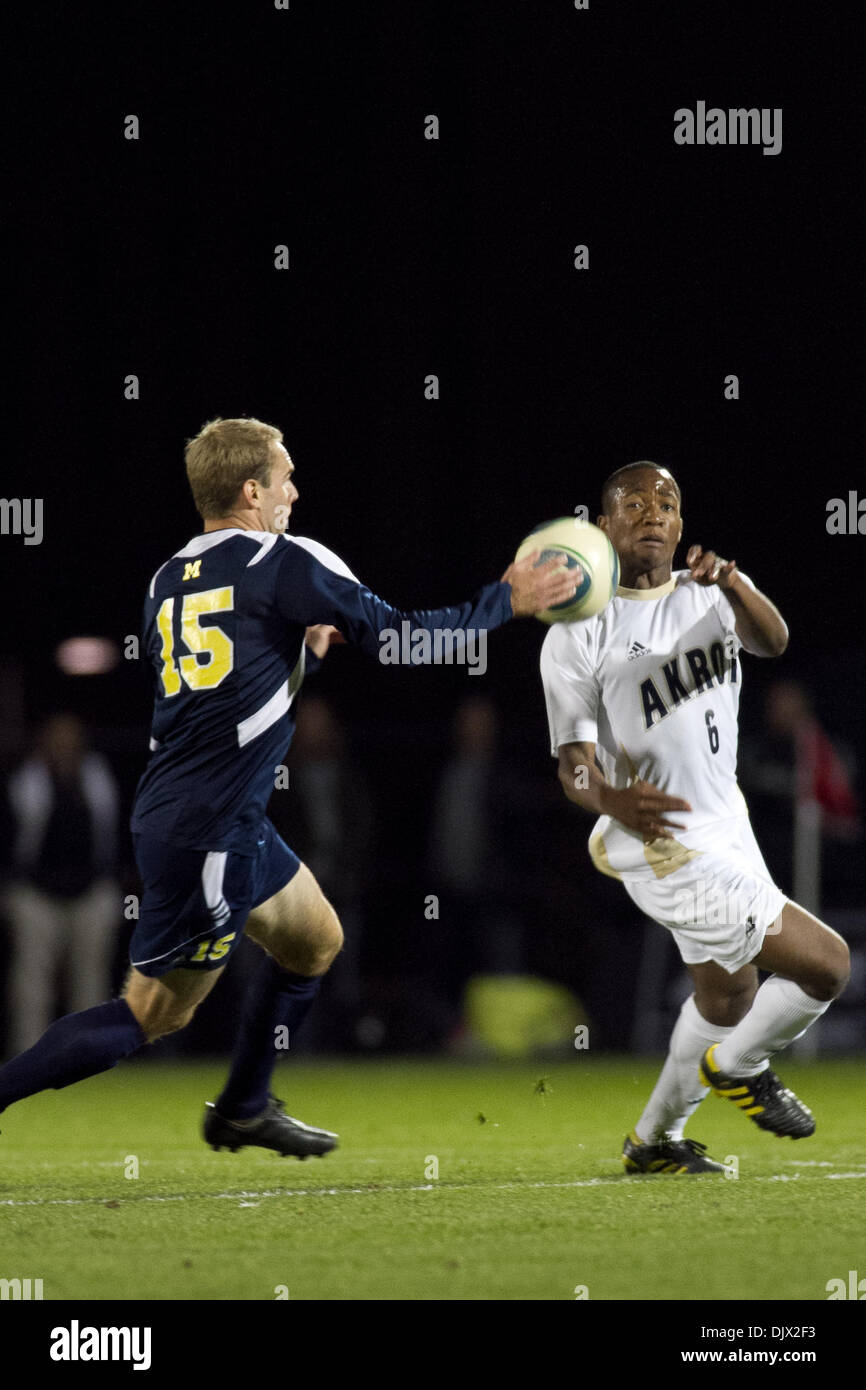 Oct. 19, 2010 - Akron, Ohio, United States of America - Oct. 19, 2010 - Akron, Ohio - Akron Zips f/mf Darlington Nagbe (#6) fights for the ball with Michigan Wolverines defender Brian Klemczak (#15) during a game between the Akron Zips and the Michigan Wolverines at Lee Jackson Field.  Akron beat Michigan 7-1. (Credit Image: © Bryan Rinnert/Southcreek Global/ZUMApress.com) Stock Photo