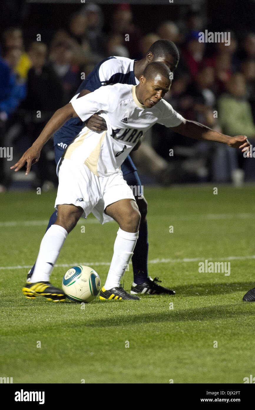 Oct. 19, 2010 - Akron, Ohio, United States of America - Oct. 19, 2010 - Akron, Ohio - Akron Zips f/mf Darlington Nagbe (#6) fights for control of the ball during a game between the Akron Zips and the Michigan Wolverines at Lee Jackson Field.  Akron beat Michigan 7-1. (Credit Image: © Bryan Rinnert/Southcreek Global/ZUMApress.com) Stock Photo