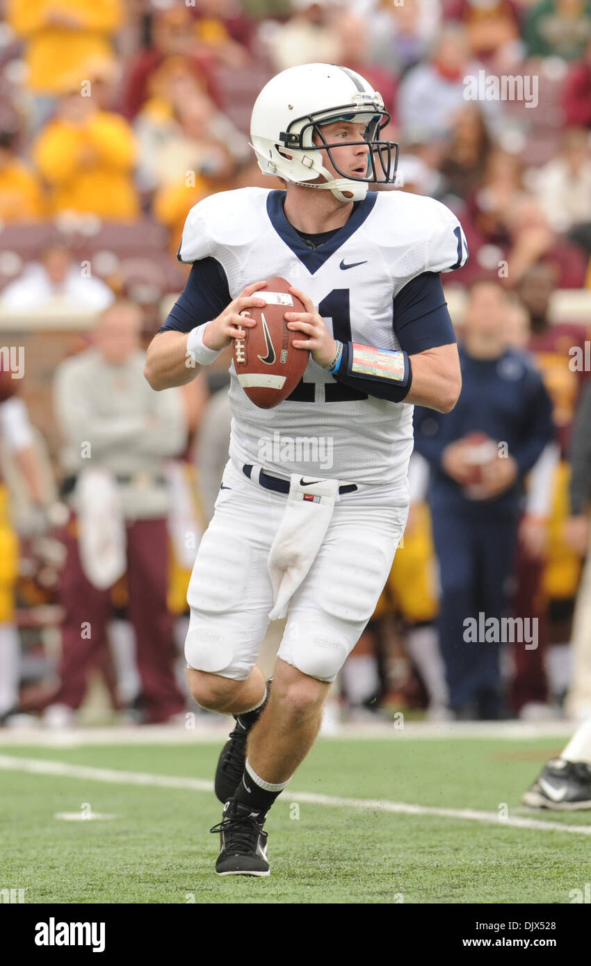 Oct. 23, 2010 - Minneapolis, Minnesota, United States of America - Penn State University quarterback Matthew McGloin (#11) falls back to pass in the third quarter of the game between the Minnesota Gophers and the Penn State Nittany Lions at the TCF Stadium in Minneapolis, Minnesota.  Penn State defeats  Minnesota 33-21. (Credit Image: © Marilyn Indahl/Southcreek Global/ZUMApress.co Stock Photo