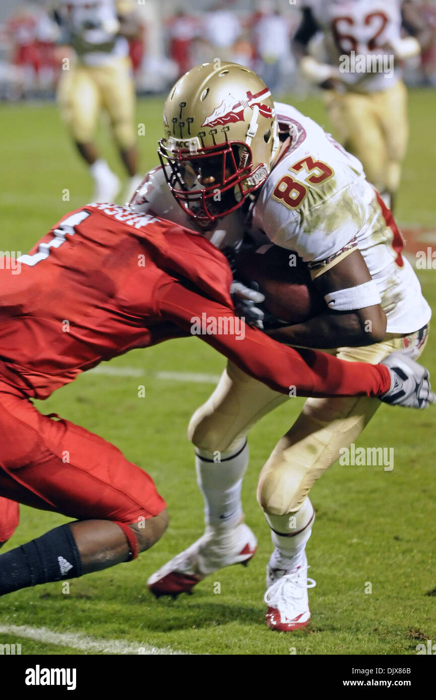Oct. 28, 2010 - Raleigh, North Carolina, United States of America - October 28, 2010: North Carolina State DB David Amerson (1) tackles FSU WR Bert Reed (83) after an 18 yard reception by Reed. NC State defeated FSU 28-24 at Carter Finley Stadium in Raleigh, North Carolina. (Credit Image: © Mike Olivella/ZUMApress.com) Stock Photo