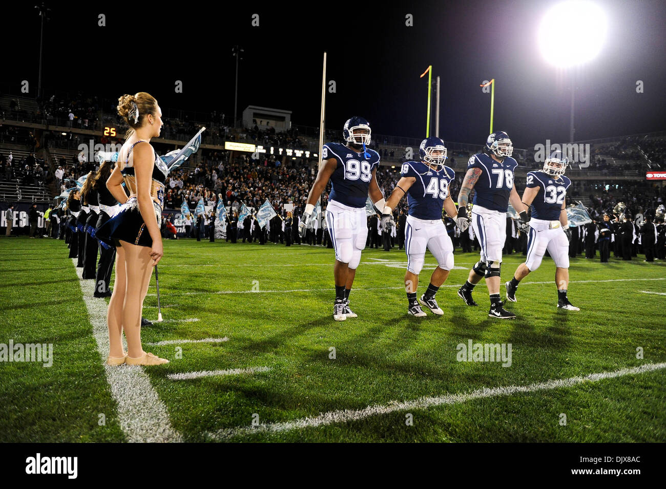 Oct. 29, 2010 - East Hartford, Connecticut, United States of America - The UConn Husky captains walk onto the field before the rest of the team. At the half West Virginia leads UConn 10-3 at Rentschler Field. (Credit Image: © Geoff Bolte/Southcreek Global/ZUMApress.com) Stock Photo