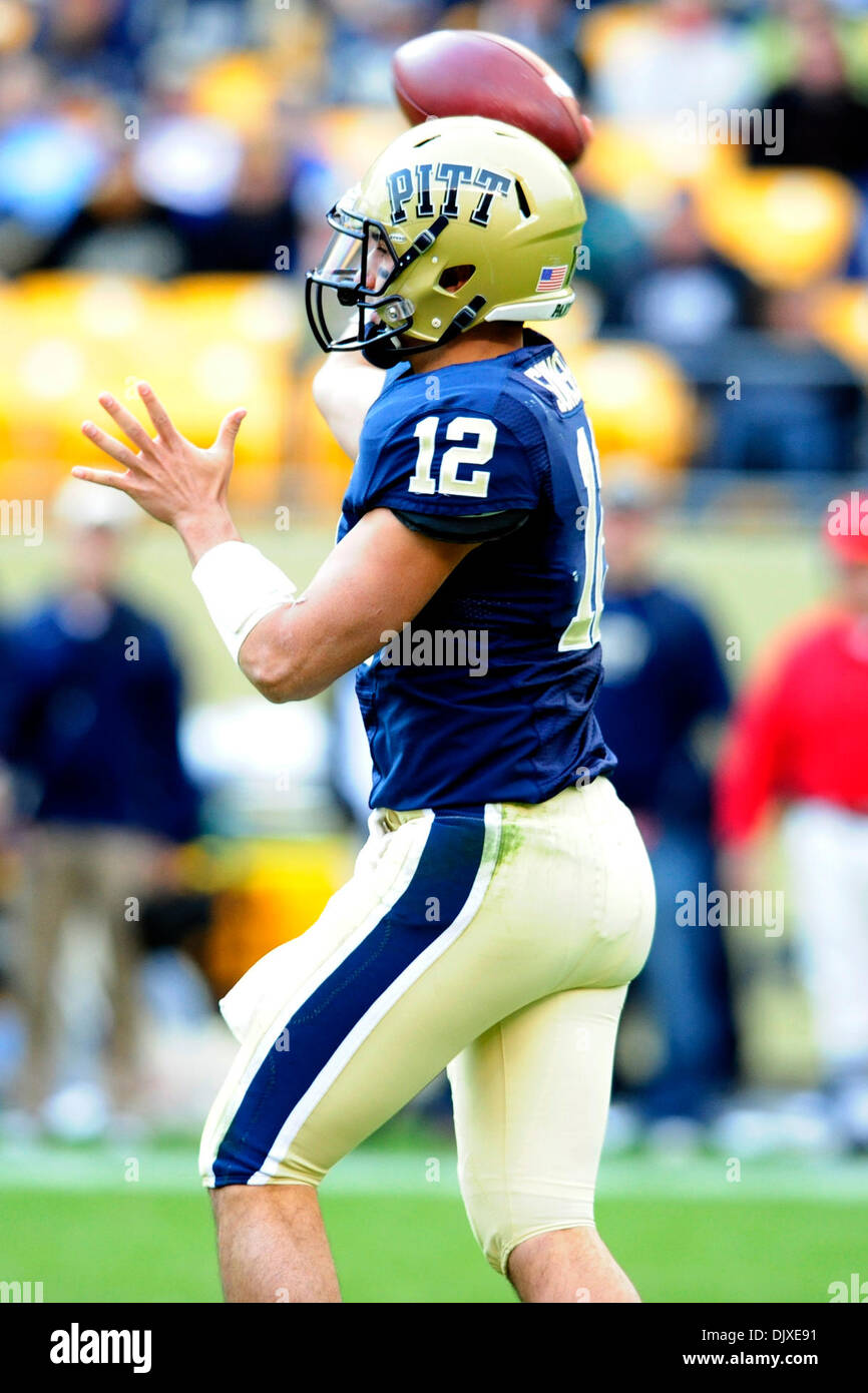 Oct. 31, 2010 - Pittsburgh, Pennsylvania, United States of America - 30 October 2010: Pittsburgh Panther QB Tino Sunseri (#12) throws a pass in 1st half action at Heinz Field in Pittsburgh Pennsylvania. Pittsburgh defeats Louisville 20-3. (Credit Image: © Paul Lindenfelser/Southcreek Global/ZUMApress.com) Stock Photo