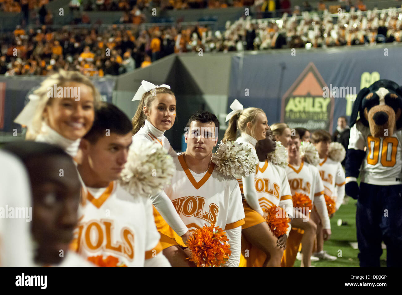 Nov. 6, 2010 - St. Louis, Tennessee, United States of America - The Tennessee Volunteers Cheerleaders sit on the sidelines during an injury timeout late in the second half of playduring the NCAA regular season game between the University of Tennessee Volunteers at University of Memphis Tigers at Liberty Bowl Memorial Stadium. Volunteers defeats the Tigers 50 - 14 at the Final. (Cre Stock Photo