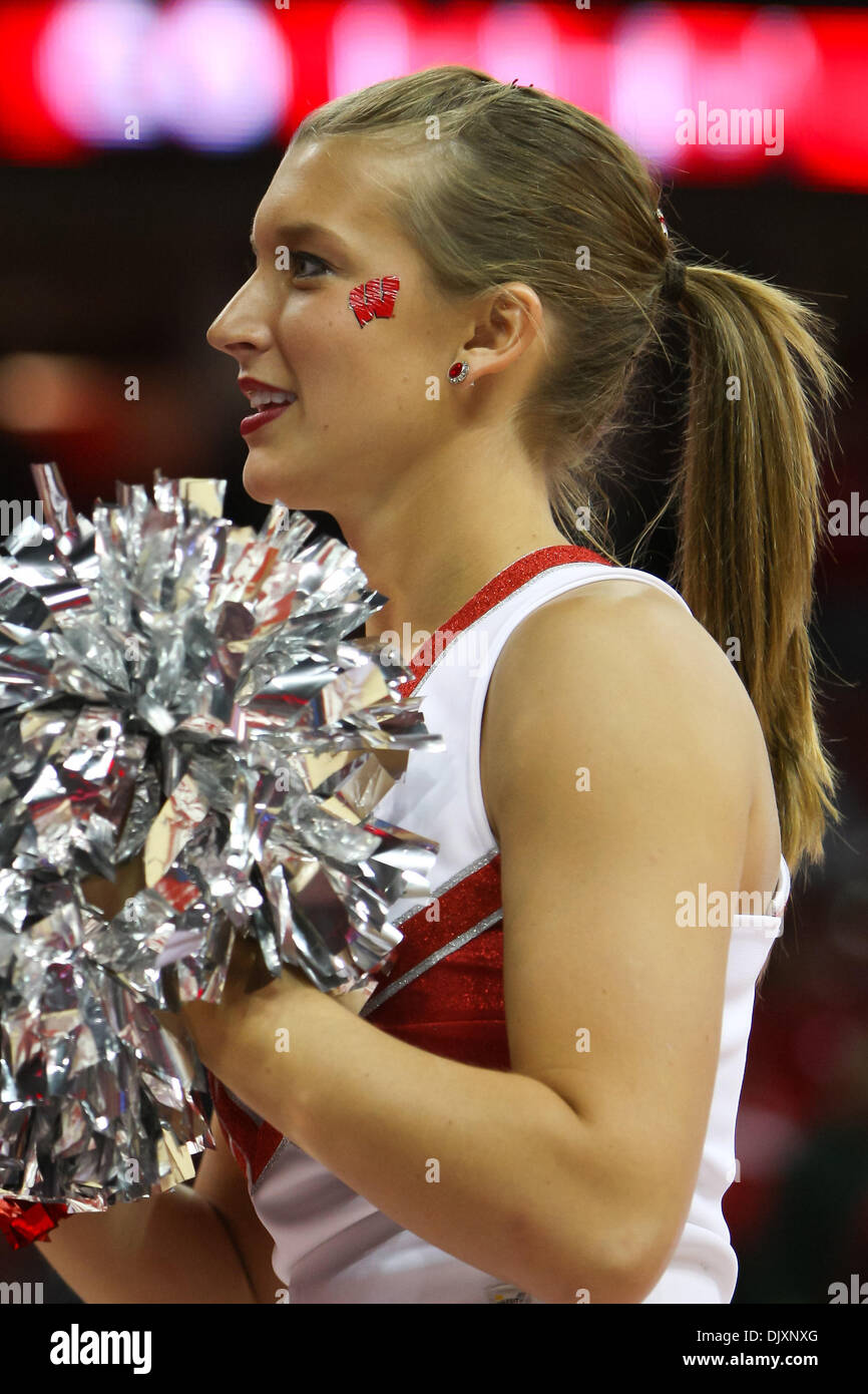 Nov. 11, 2010 - Madison, Wisconsin, United States of America - Wisconsin cheerleader looking up toward the stands during a break in action. Wisconsin Badgers defeated the Minnesota State-Mankato Mavericks 93 - 59 in an exhibition game at the Kohl Center in Madison, Wisconsin. (Credit Image: © John Fisher/Southcreek Global/ZUMApress.com) Stock Photo