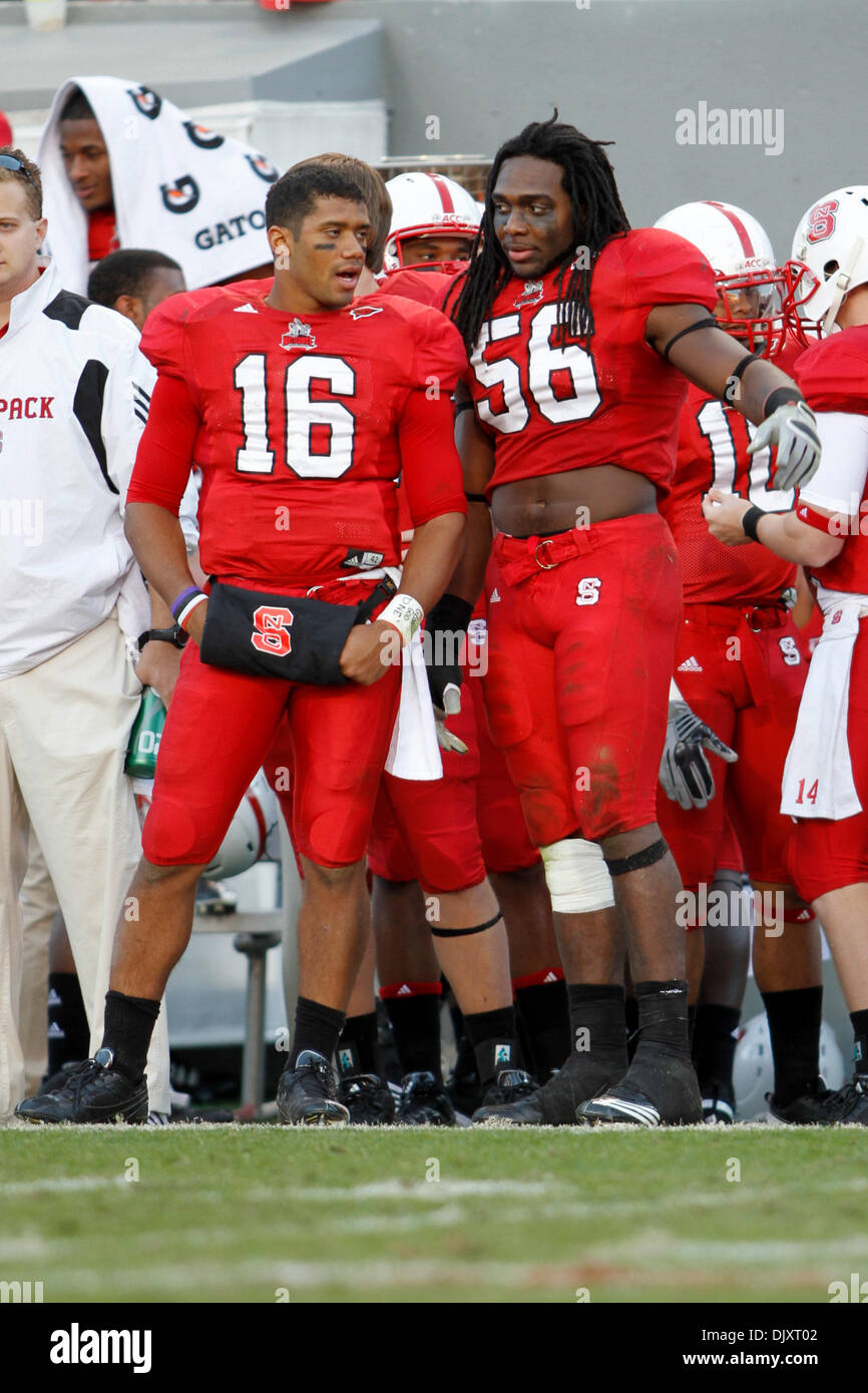 Nov. 13, 2010 - Raleigh, Carter-Finley Stadium, United States of America - NC  State quarterback Russell Wilson (#16) talks with linebacker Nate Irving  (#56) late in the game. NC State wins big
