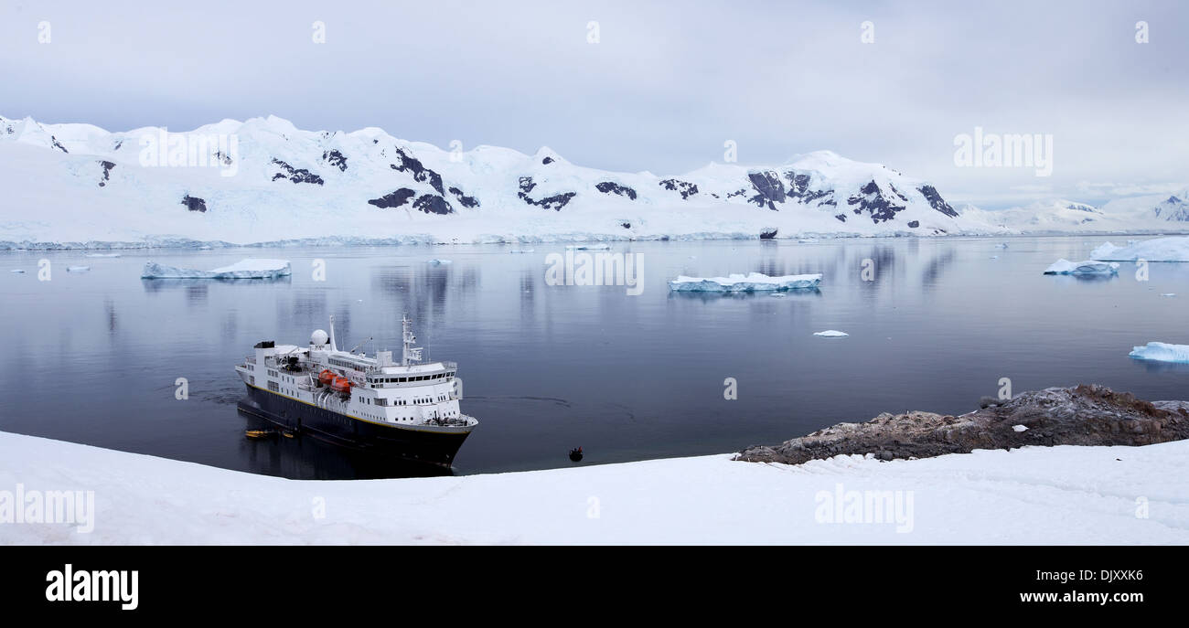 Cruise ship docked in Antarctic waters Stock Photo