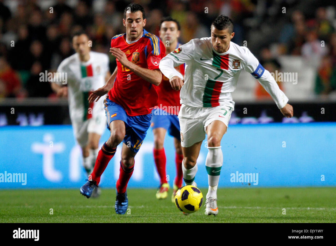 Nov 17, 2010 - Lisbon, Portugal - Portuguese CRISTIANO RONALDO (R) vies with Spanish SERGIO BUSQUETS (L) during their soccer match to promote the candidacy of the two countries to the World Cup for 2018 and 2022 at Luz Stadium in Lisbon. (Credit Image: © Paul Cordeiro/ZUMApress.com) Stock Photo