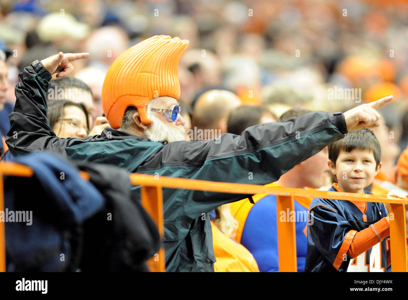 Nov. 20, 2010 - Syracuse, New York, United States of America - A Syracuse fan does his best Johnny Bravo impersonation in the fourth quarter of Connecticut's win over Syracuse by a score of 23-6 at the Carrier Dome in Syracuse, New York. (Credit Image: © Michael Johnson/Southcreek Global/ZUMAPRESS.com) Stock Photo