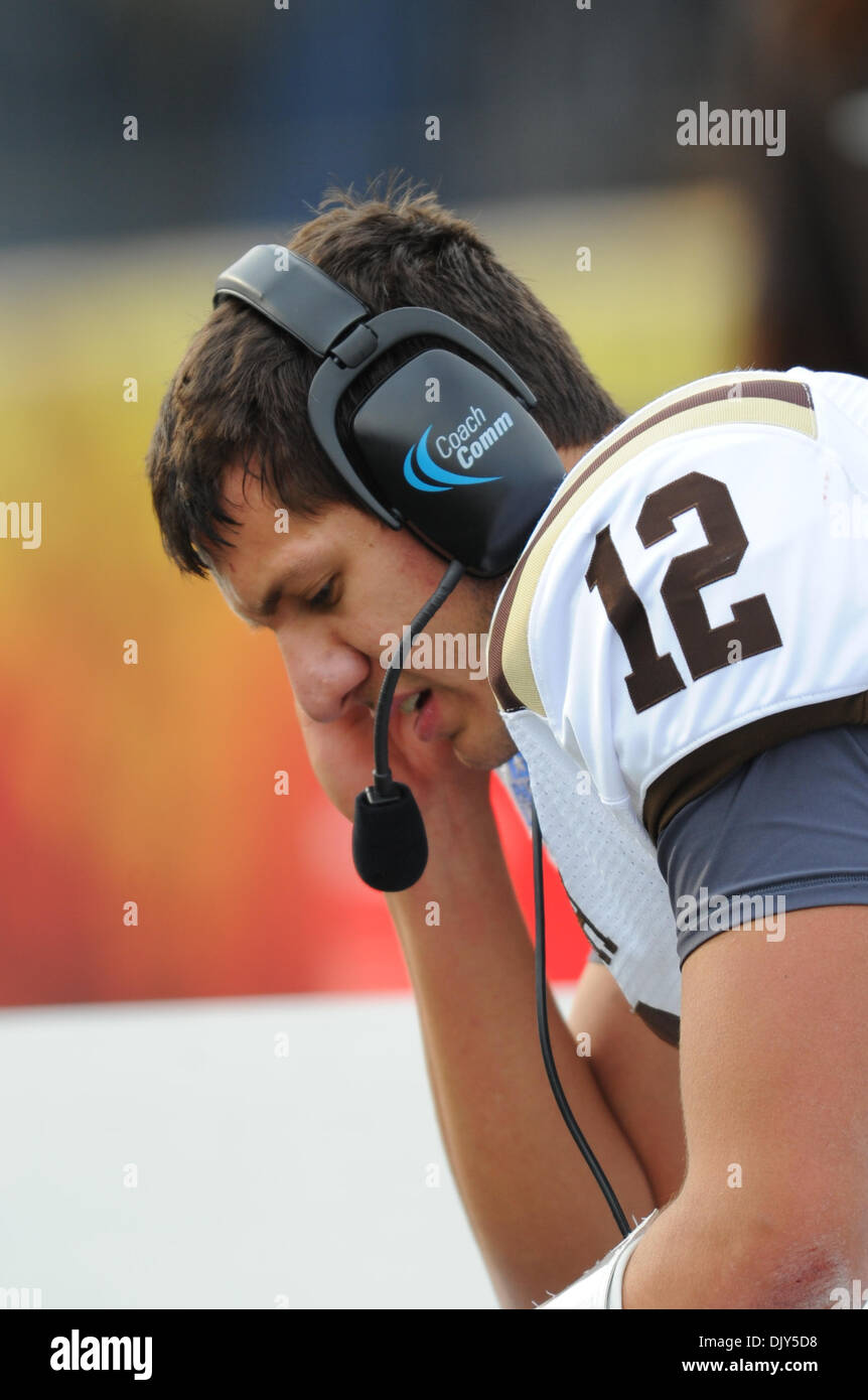 Nov. 20, 2010 - Easton, Pennsylvania, United States of America - Lehigh quarterback Chris Lum (12) talks with the coaches in the booth after completing a touchdown pass against Lafayette during the 146 meeting between Lehigh University vs Lafayette College, the longest continuous rivalry in college football, at Fischer Field in Easton Pennsylvania.  Lehigh defeats Lafayette by a sc Stock Photo