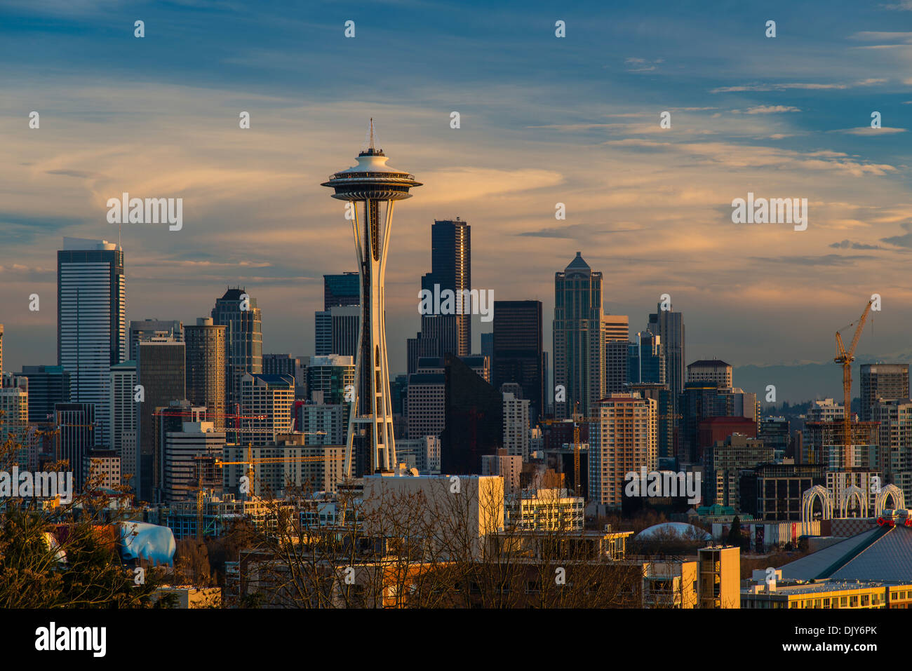 Downtown skyline view at sunset from Queen Anne with Space Needle and Mount Rainier behind, Seattle, Washington, USA Stock Photo