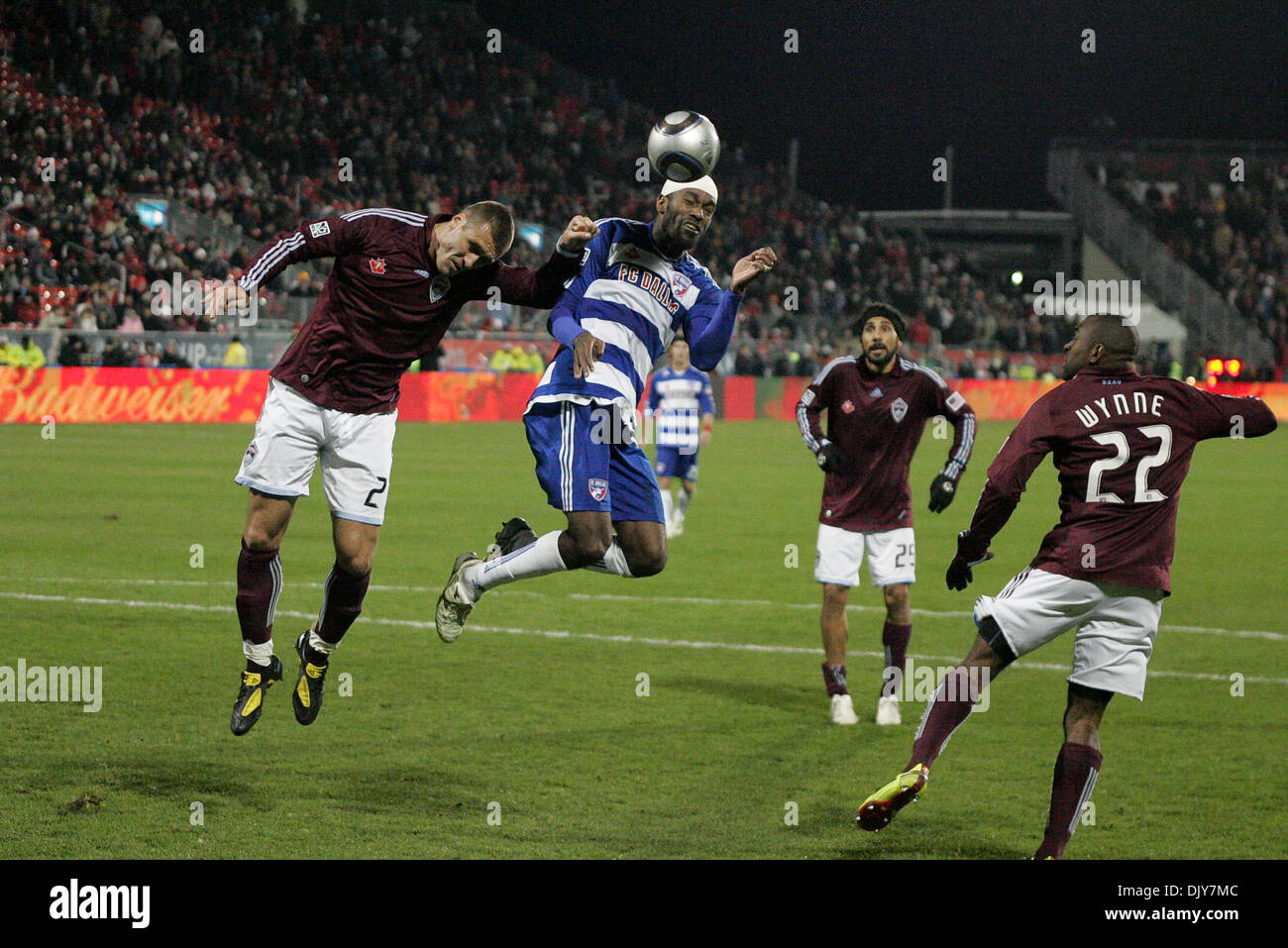 Nov. 21, 2010 - Toronto, Ontario, Canada - Colorado Rapids Defender L (#3) Drew Moore goes for the header against FC Dallas Midfielder R (#18) Marvin Chavez  late in extra-time. The game was played at BMO Field in Toronto, Ontario. The Colorado Rapids defeated FC Dallas 2-1 in extra-time to win the MLS Cup. (Credit Image: © Steve Dormer/Southcreek Global/ZUMAPRESS.com) Stock Photo