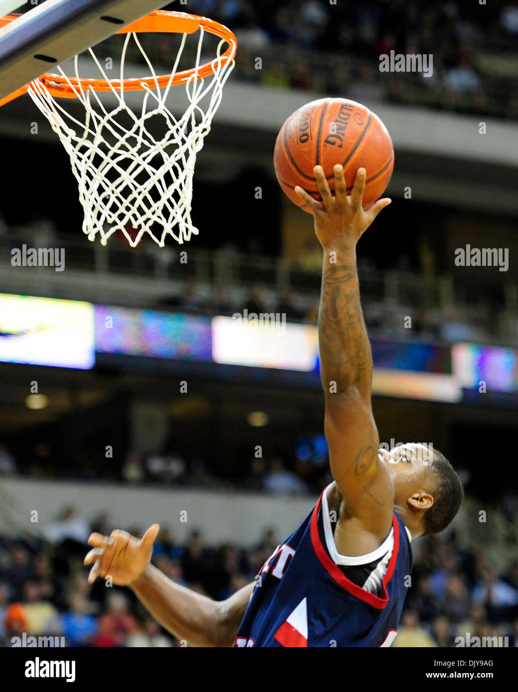 Nov. 23, 2010 - Pittsburgh, Pennsylvania, United States of America - 23 November 2010: Robert Morris G Velton Jones (#2)drives to the hoop for an easy lay up against the Pittsburgh Panthers in 2nd half action at the Petersen Events Center in Pittsburgh Pennsylvania. Pittsburgh defeats Robert Morris 74-53. (Credit Image: © Paul Lindenfelser/Southcreek Global/ZUMAPRESS.com) Stock Photo