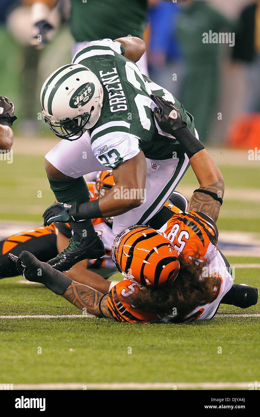 Nov. 25, 2010 - East Rutherford, New Jersey, United States of America - New York Jets running back Shonn Greene #23 runs over Cincinnati Bengals linebacker Rey Maualuga #58 during the game at the Meadowlands. The New York Jets defeat the Cincinnati Bengals 26-10 at the New Meadowlands. (Credit Image: © Shane Psaltis/Southcreek Global/ZUMAPRESS.com) Stock Photo