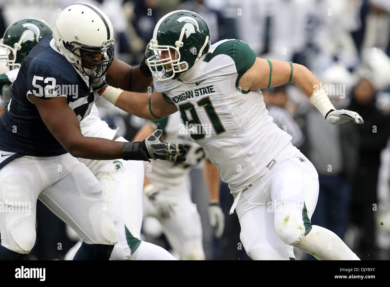 Nov. 27, 2010 - University Park, Pennsylvania, United States of America - Penn State Nittany Lions offensive tackle Chimaeze Okoli (52) and Michigan State Spartans defensive end Tyler Hoover (91) in action during a game at Beaver Stadium in University Park, Pennsylvania. (Credit Image: © Alex Cena/Southcreek Global/ZUMAPRESS.com) Stock Photo