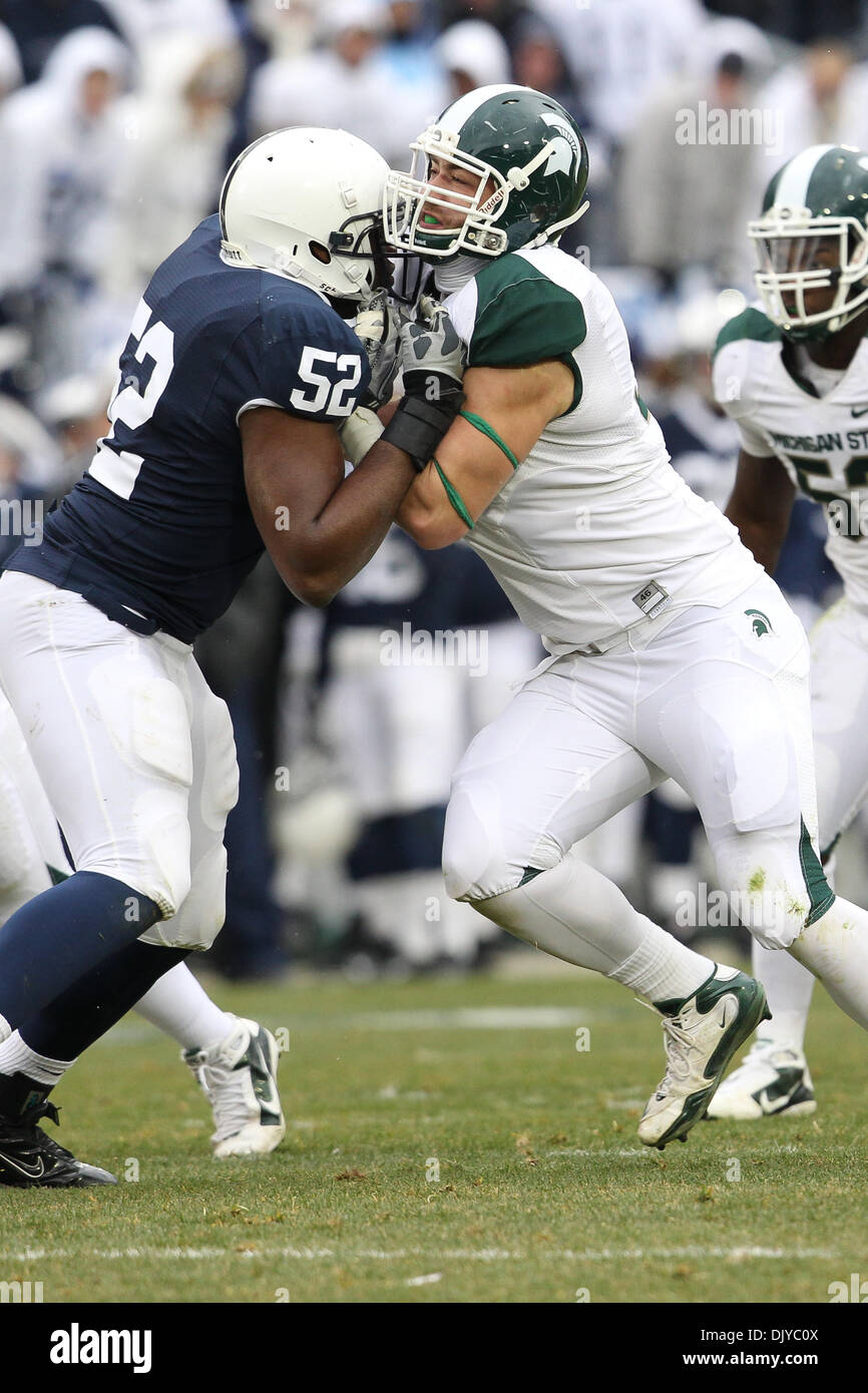 Nov. 27, 2010 - University Park, Pennsylvania, United States of America - Penn State Nittany Lions offensive tackle Chimaeze Okoli (52) and Michigan State Spartans defensive end Tyler Hoover (91) during the Penn State Nittany Lions and the Michigan State Spartans game at Beaver Stadium in University Park, Pennsylvania. (Credit Image: © Alex Cena/Southcreek Global/ZUMAPRESS.com) Stock Photo