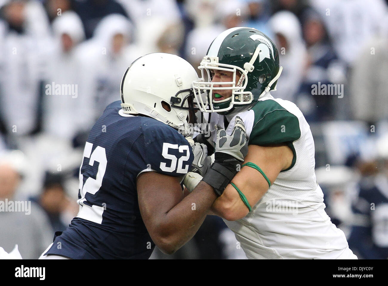 Nov. 27, 2010 - University Park, Pennsylvania, United States of America - Penn State Nittany Lions offensive tackle Chimaeze Okoli (52) and Michigan State Spartans defensive end Tyler Hoover (91) during the Penn State Nittany Lions and the Michigan State Spartans game at Beaver Stadium in University Park, Pennsylvania. (Credit Image: © Alex Cena/Southcreek Global/ZUMAPRESS.com) Stock Photo