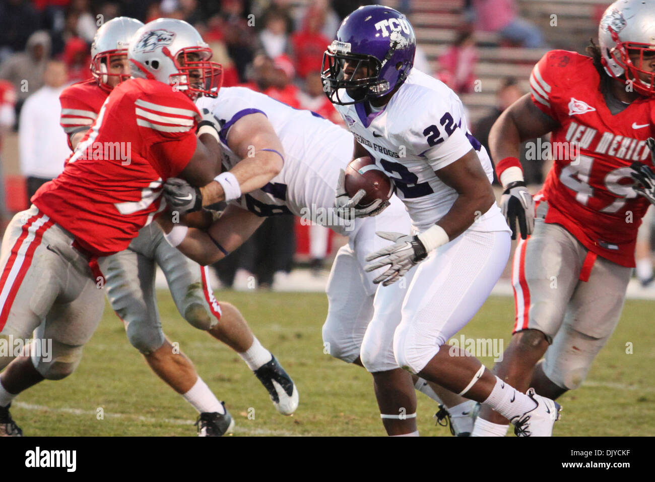 Nov. 27, 2010 - Albuquerque, New Mexico, United States of America - Texas Christian University tail back Jercell Fort (#22) making his way through the Lobo defense. The Mountain West Conference Champions TCU defeated the Lobos 66-17 at University Stadium in Albuquerque, New Mexico. (Credit Image: © Long Nuygen/Southcreek Global/ZUMAPRESS.com) Stock Photo