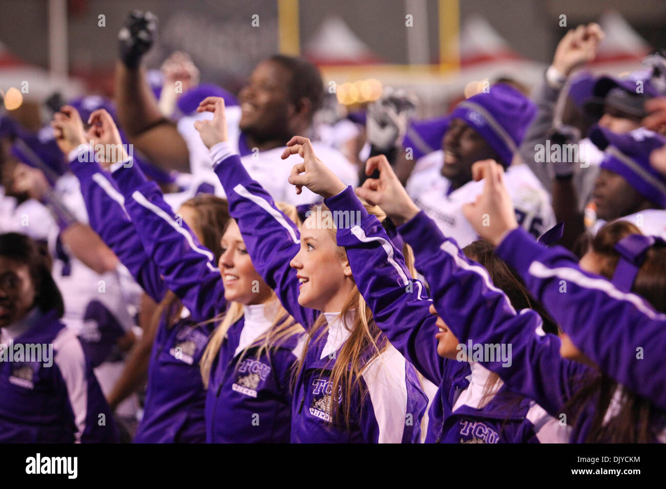 Nov. 27, 2010 - Albuquerque, New Mexico, United States of America - The Texas Christian University cheerleaders and players gather after the game to sing their school song. The Mountain West Conference Champions TCU defeated the Lobos 66-17 at University Stadium in Albuquerque, New Mexico. (Credit Image: © Long Nuygen/Southcreek Global/ZUMAPRESS.com) Stock Photo