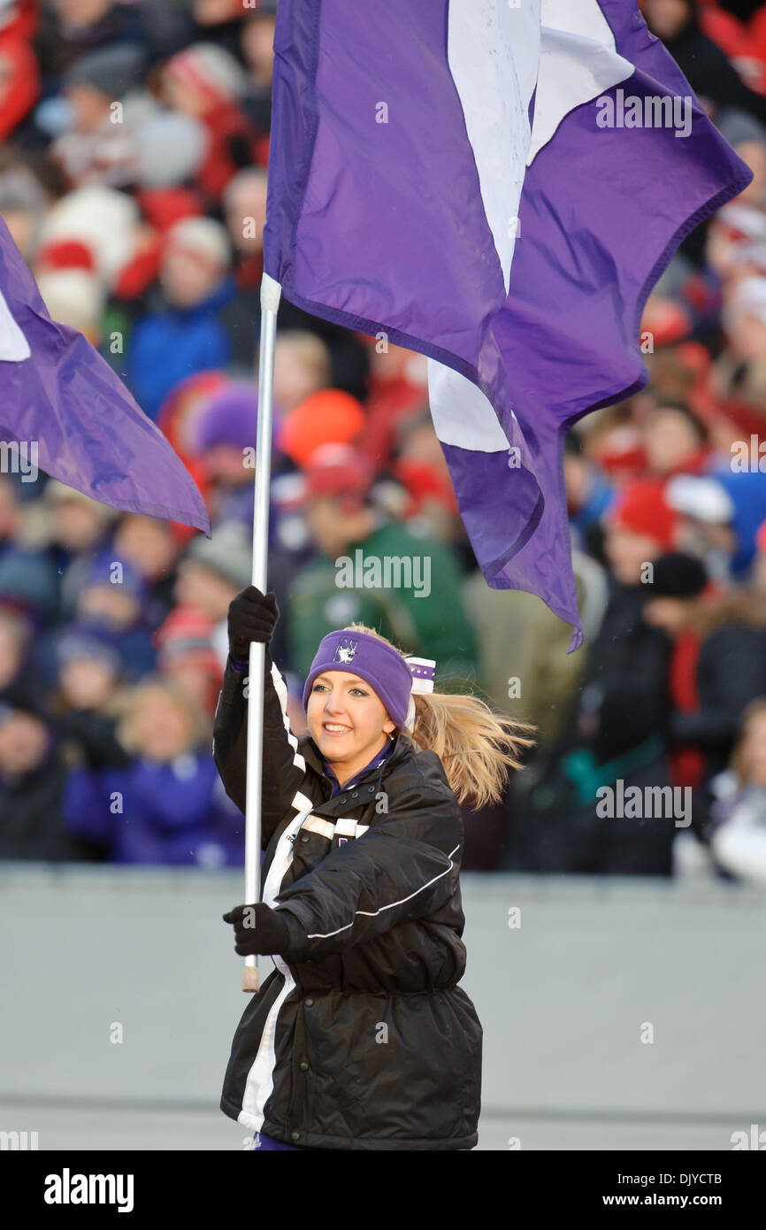 Nov. 27, 2010 - Madison, Wisconsin, United States of America - A Northwestern cheerleader celebrates a touchdown during the game between the Northwestern Wildcats and the Wisconsin Badgers at Camp Randall Stadium, Madison, Wisconsin.  Wisconsin defeated Northwestern 70-23. (Credit Image: © John Rowland/Southcreek Global/ZUMAPRESS.com) Stock Photo