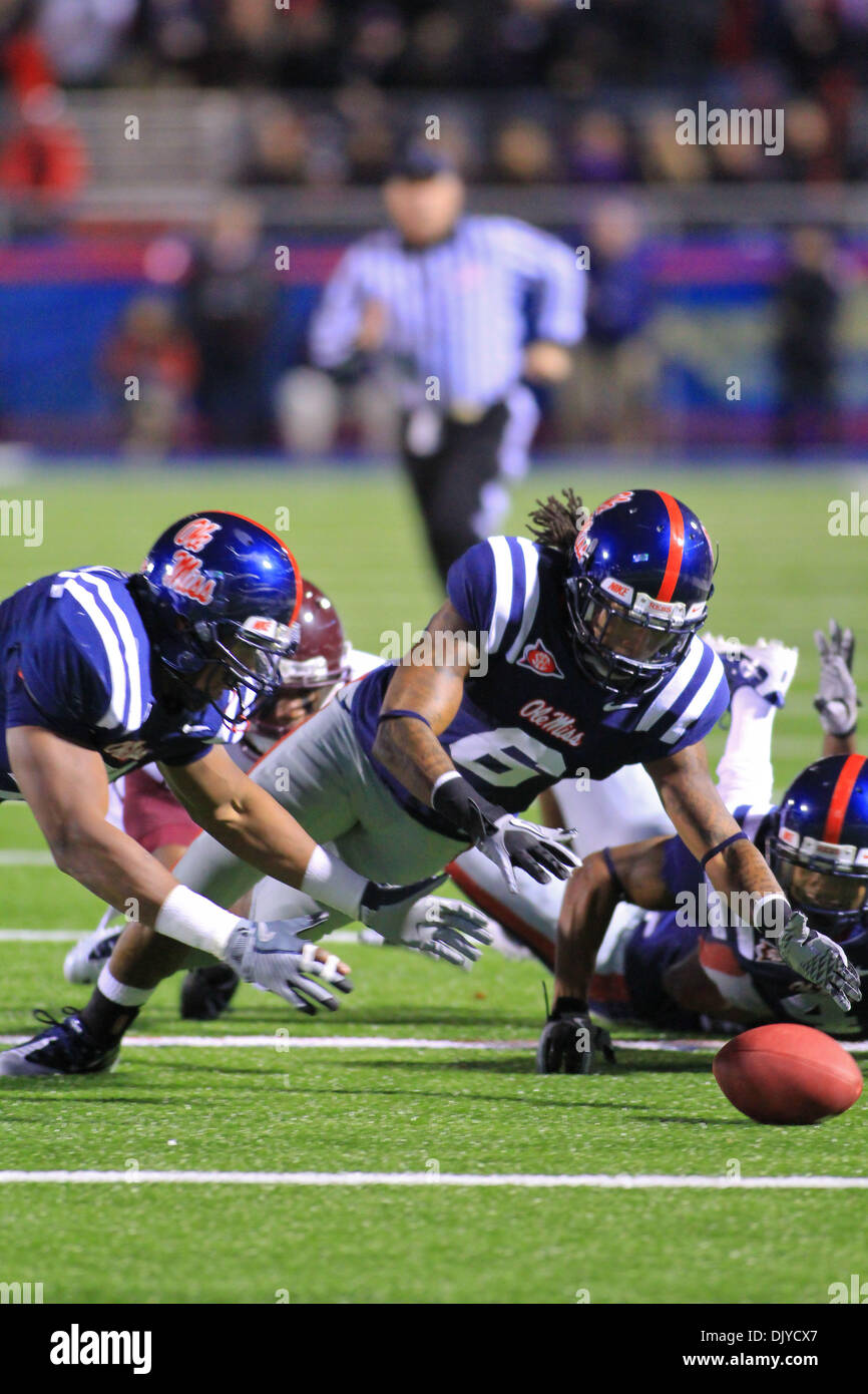Nov. 27, 2010 - Oxford, Mississippi, United States of America - Ole Miss CB Jeremy McGee (6) falls on the ball after striping it from the receiver during Mississippi State's 31-23 victory over Ole Miss in Oxford, MS. (Credit Image: © Hays Collins/Southcreek Global/ZUMAPRESS.com) Stock Photo