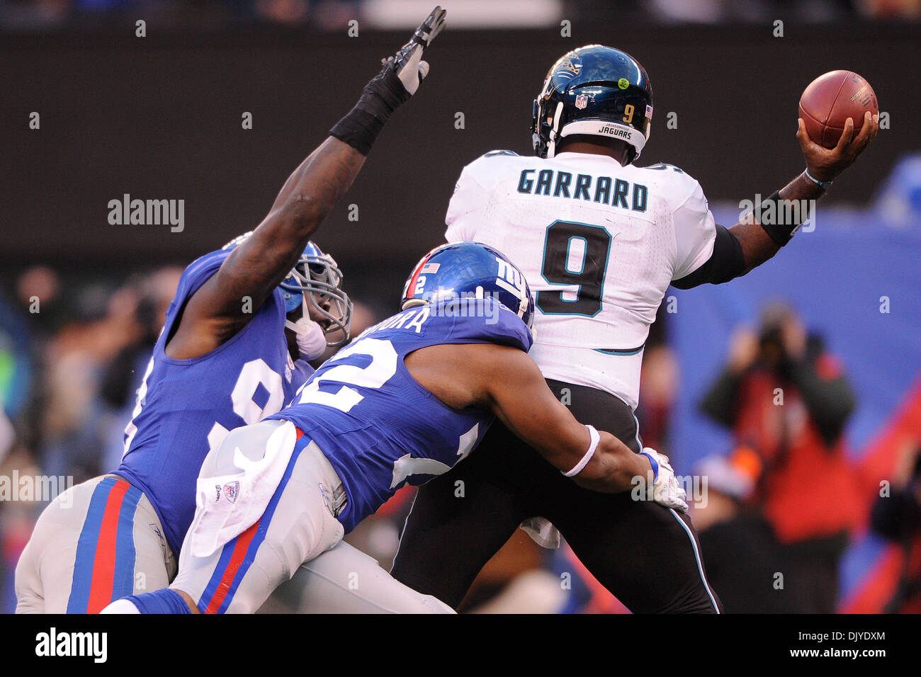 New York Giants defensive end Osi Umenyiora (72) and New York Giants defensive end Jason Pierre