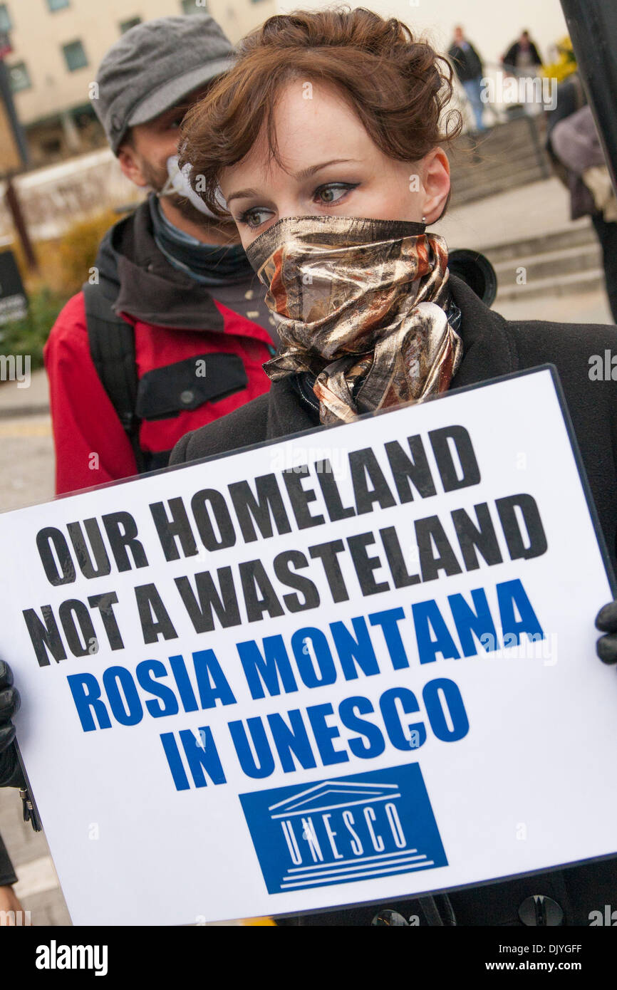 Islington, London. 1st Dec 2013. Romanians protest outside the Mining and Money conference at the Business Design Centre in Islington, against the establishment of a vast open cast gold mine at Rosia Montana in Transylvania, which will use large quantities of cyanide in its processes. Credit:  Paul Davey/Alamy Live News Stock Photo