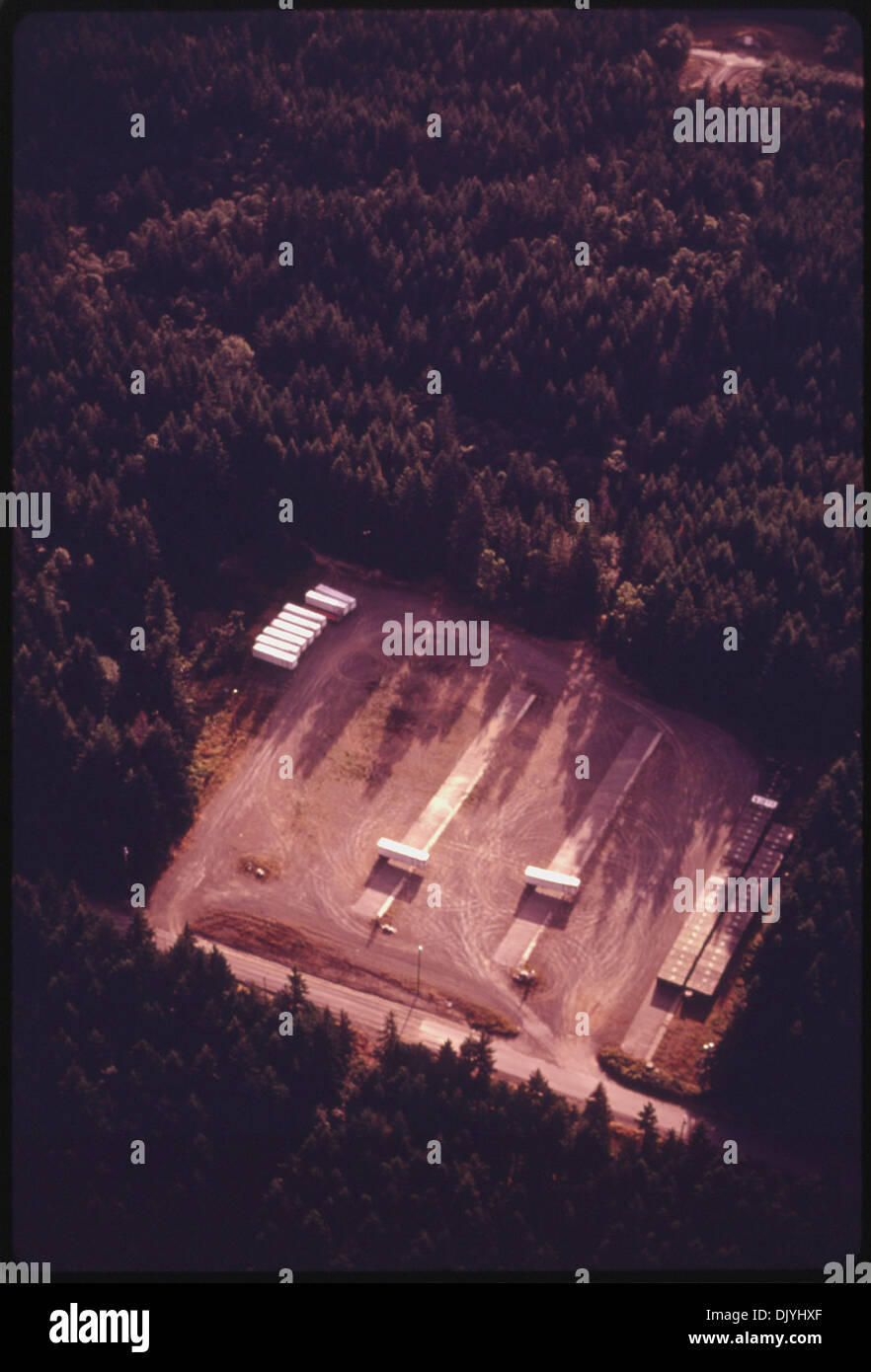 AERIAL VIEW OF A TYPICAL STORAGE YARD AT THE BANGOR ANNEX NAVY INSTALLATION. IT IS SURROUNDED BY REGROWTH DOUGLAS... 556921 Stock Photo