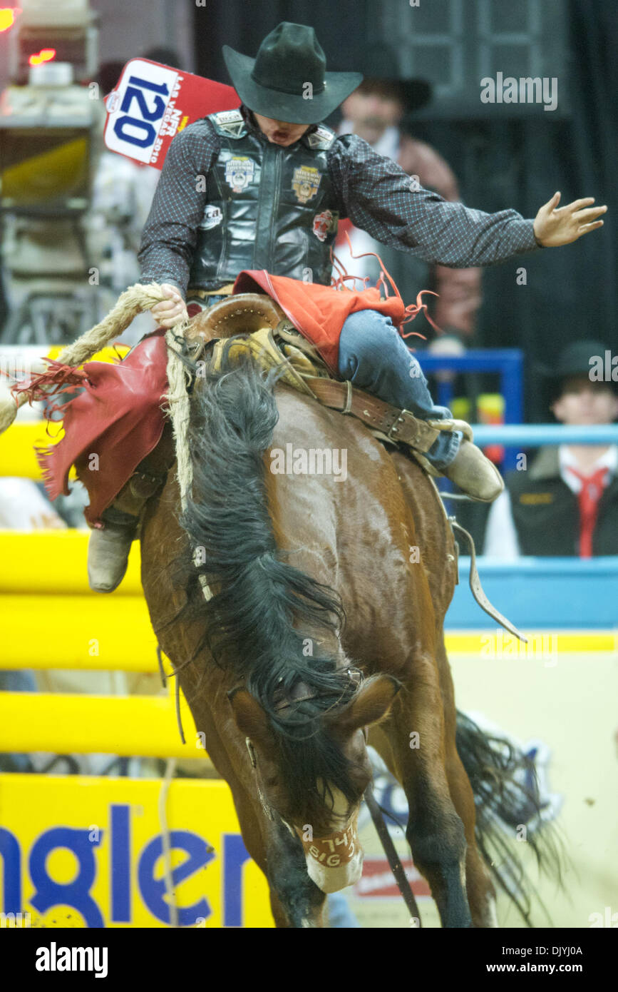 Dec. 3, 2010 - Las Vegas, Nevada, United States of America - Jesse Wright of Millford, UT rides Big Jet for a score of 85.50 during the second go-round at the 2010 Wrangler National Finals Rodeo at the Thomas & Mack Center.  Wright tied for second in the go-round and picked up a check for $12,145.43. (Credit Image: © Matt Cohen/Southcreek Global/ZUMAPRESS.com) Stock Photo