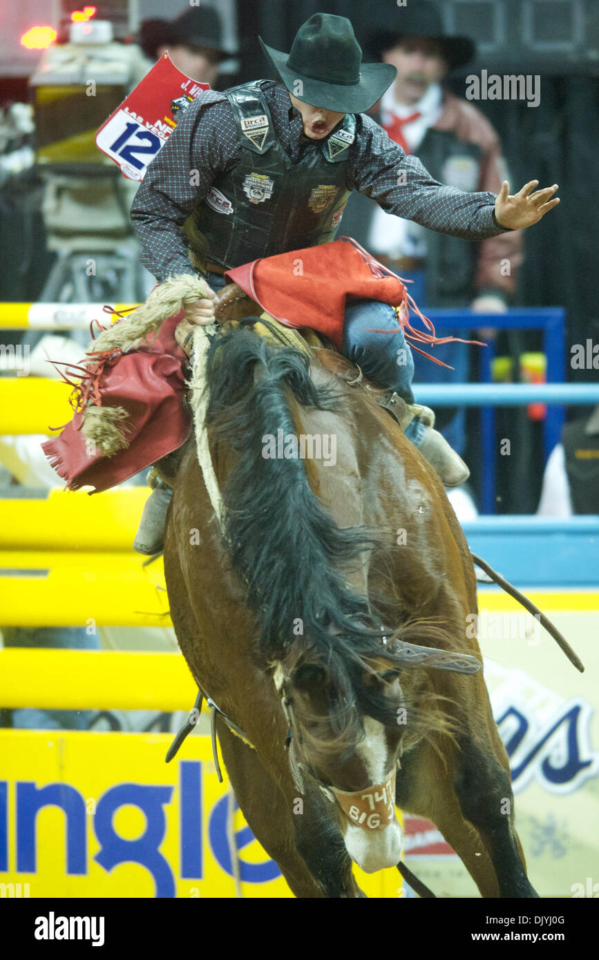 Dec. 3, 2010 - Las Vegas, Nevada, United States of America - Jesse Wright of Millford, UT rides Big Jet for a score of 85.50 during the second go-round at the 2010 Wrangler National Finals Rodeo at the Thomas & Mack Center.  Wright tied for second in the go-round and picked up a check for $12,145.43. (Credit Image: © Matt Cohen/Southcreek Global/ZUMAPRESS.com) Stock Photo