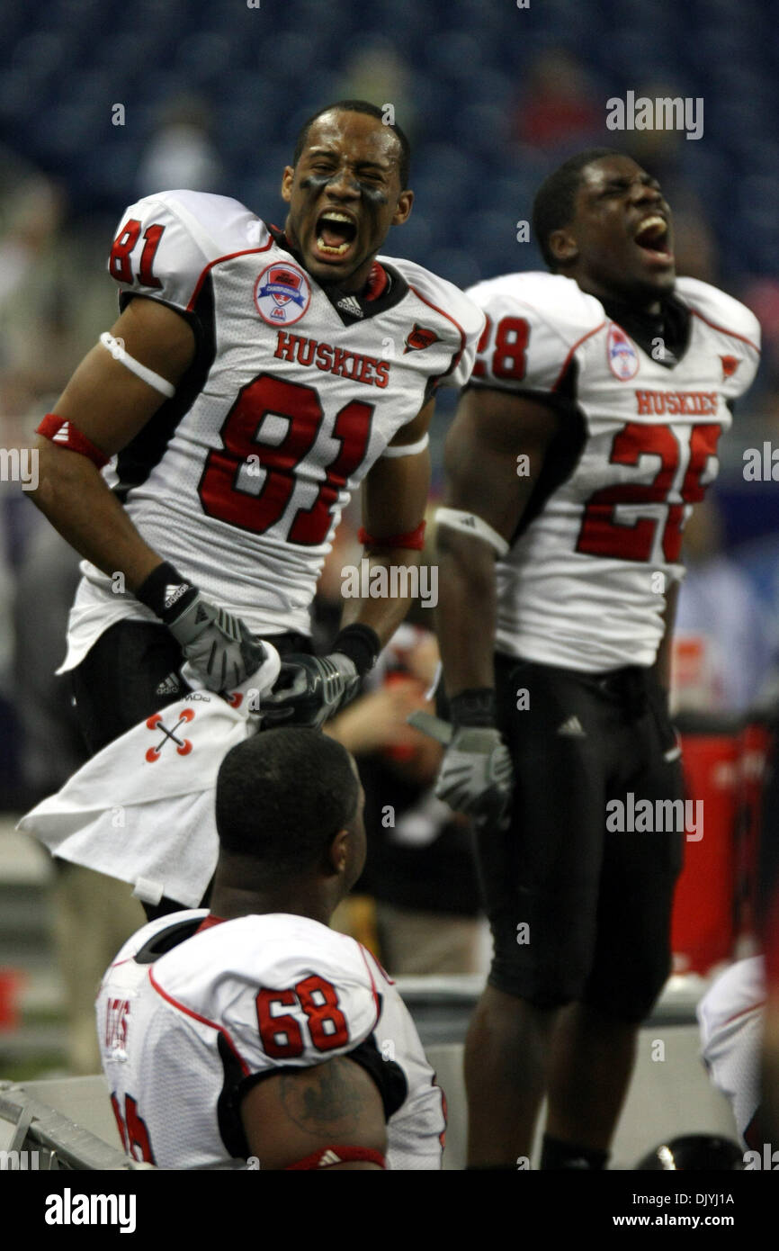 Dec. 3, 2010 - Detroit, Michigan, United States of America - Northern Illinois wide receiver Nathan Palmer (#81) and tailback Chad Spann (#28) yell from the bench to get the fans fired up. Miami defeated Northern Illinois 26-21, winning the MAC Championship. (Credit Image: © Alan Ashley/Southcreek Global/ZUMAPRESS.com) Stock Photo