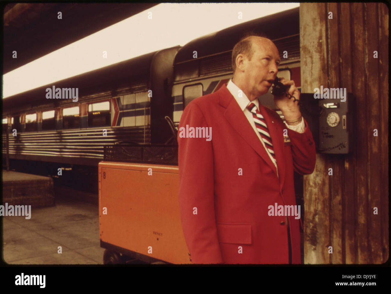 AMTRAK EMPLOYEE CHECKS WITH THE STATION AT THE LOS ANGELES UNION