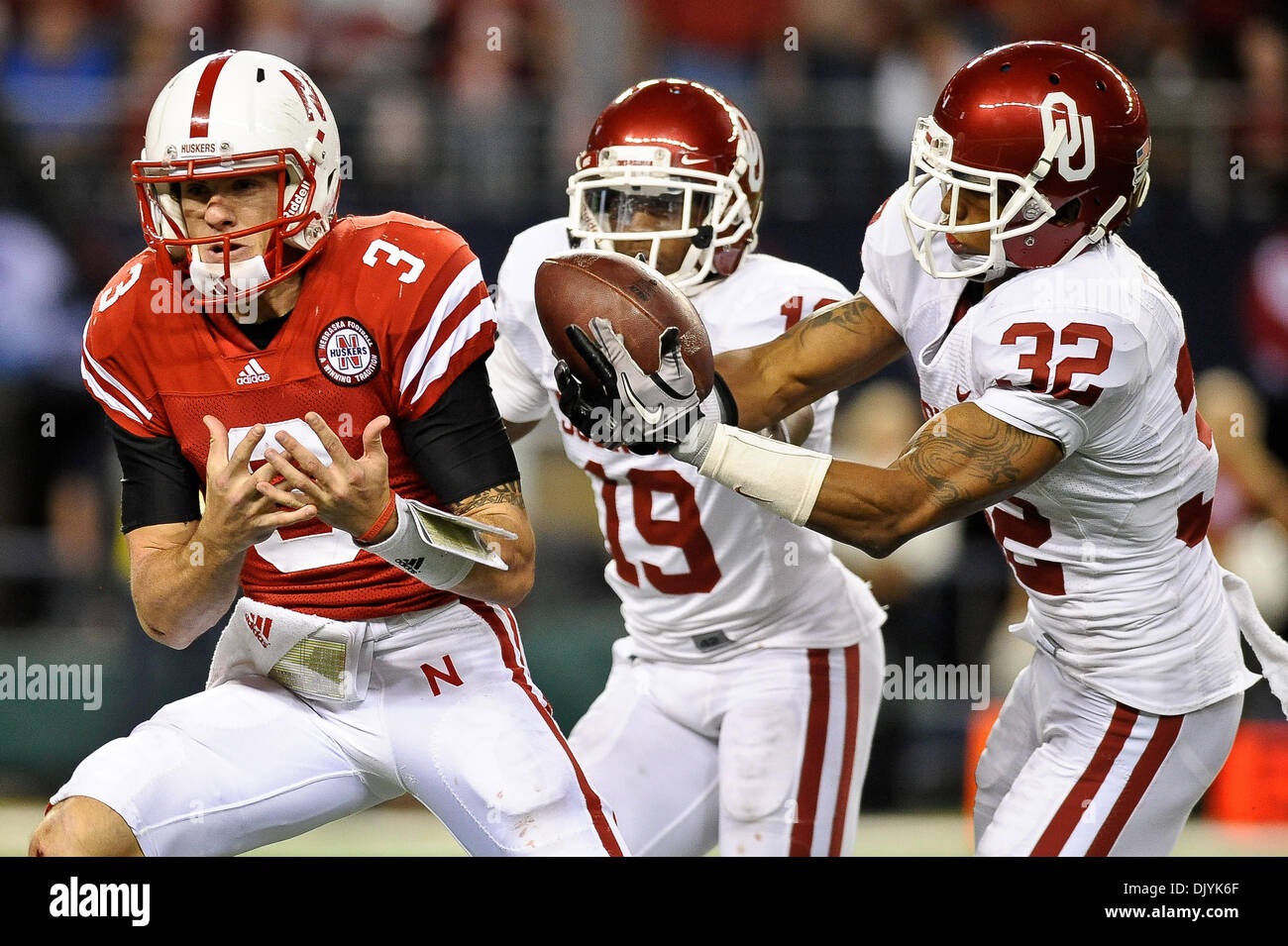 Dec. 4, 2010 - Arlington, Texas, United States of America - Oklahoma Sooners cornerback Jamell Fleming (32) defends a pass intended for Nebraska Cornhuskers quarterback Taylor Martinez (3) during the Big 12 Championship game between the University of Oklahoma and University of Nebraska. The #9 Sooners defeated the #13 Huskers 23-20 at Cowboys Stadium in Arlington, Texas. (Credit Im Stock Photo