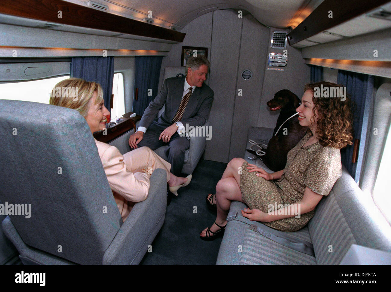 US President Bill Clinton, First Lady Hillary Rodham Clinton, daughter Chelsea and dog Buddy sit on Marine One July 24, 1998 in Washington, DC. Stock Photo