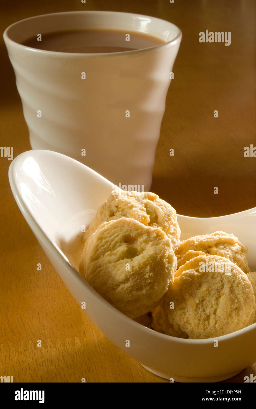 Cup of tea with biscuits Stock Photo Alamy