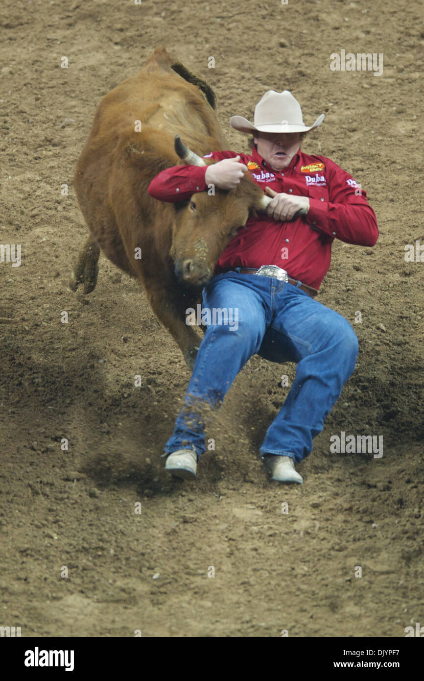 Dec. 5, 2010 - Las Vegas, Nevada, United States of America - Steer wrestler Nick Guy of Sparta, WI put up a time of 4.10 during the fourth go-round at the 2010 Wrangler National Finals Rodeo at the Thomas & Mack Center.  Guy placed fifth in the go-round and picked up a check for $4,519.23. (Credit Image: © Matt Cohen/Southcreek Global/ZUMAPRESS.com) Stock Photo