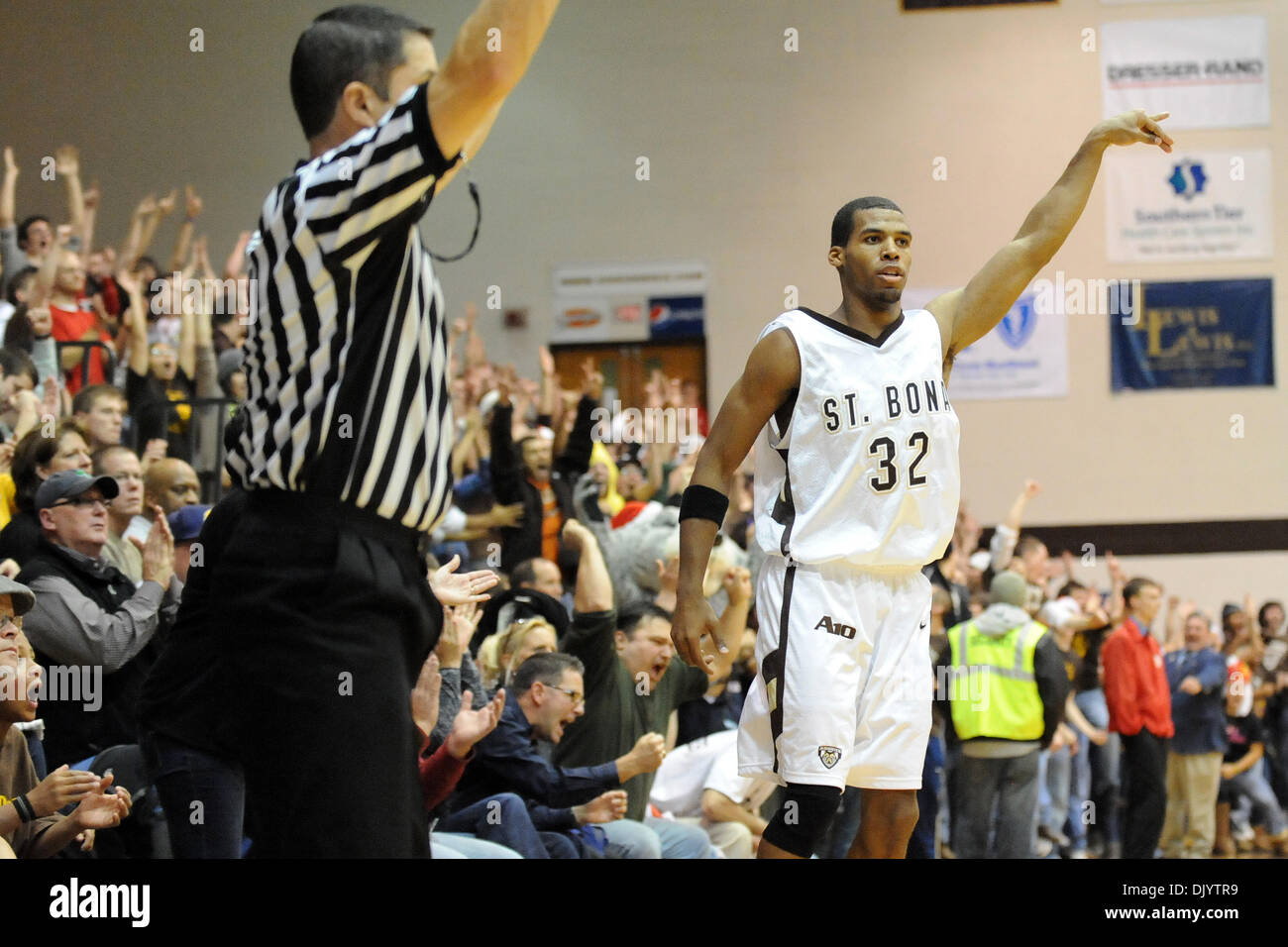 Dec. 11, 2010 - St. Bonaventure, New York, United States of America - St. Bonaventure Bonnies guard Michael Davenport (32) celebrates the three point shot as the Bonnies faithful erupts following the second half shot that tied the game against Niagara. Niagara defeated St. Bonaventure 69-61 to win their eighth strait against the Bonnies in the Purple Eagles only trip this year to t Stock Photo