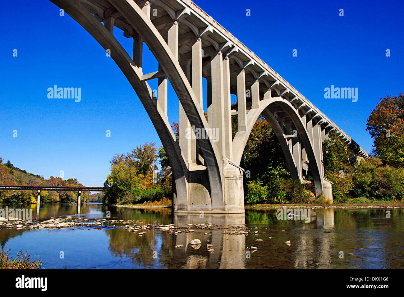 A Picturesque Roadway Bridge Over The Little Miami River On An Early Autumn Morning, Little Miami State Park, Ohio, USA Stock Photo