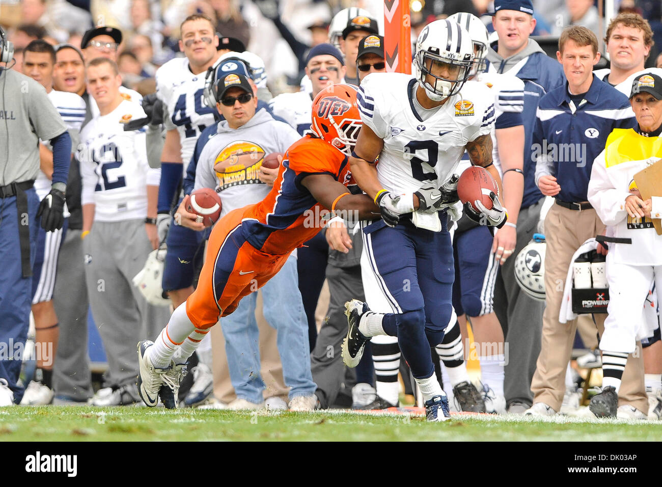 Dec. 18, 2010 - Albuquerque, New Mexico, United States of America - BYU WR Cody Hoffman (2) gets tackled by UTEP CB Travaun Nixon (5). BYU leads UTEP 31-10 at the half of the New Mexico Bowl at University Stadium. (Credit Image: © Andrew Fielding/Southcreek Global/ZUMAPRESS.com) Stock Photo