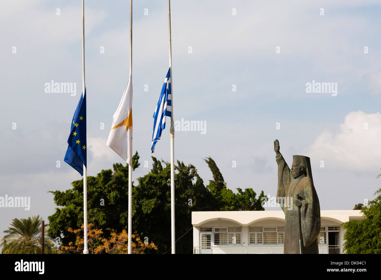 Cypriot, Greek and EU flags fly at half mast in respect for the death