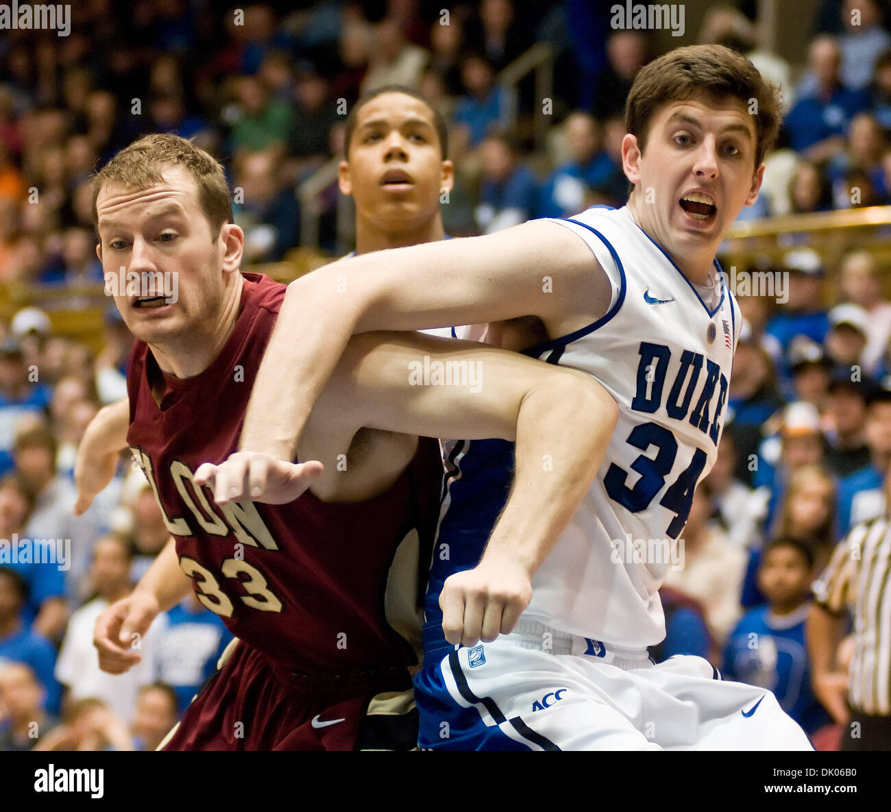 Dec. 20, 2010 - Durham, North Carolina, U.S - Duke Blue Devils forward RYAN KELLY (34) battles Elon Phoenix forward SCOTT GRABLE (33). Duke beat Elon 98-72 at Cameron Indoor Stadium. (Credit Image: © Mark Abbott/Southcreek Global/ZUMAPRESS.com) Stock Photo