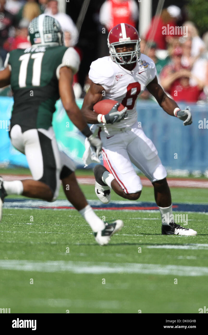 Jan. 1, 2011 - Orlando, Florida, U.S - Alabama Crimson Tide wide receiver Julio Jones (8) clears the end as Michigan State Spartans safety Marcus Hyde (11) looks to make the stop. Alabama leads at halftime 28-0. (Credit Image: © Jim Dedmon/Southcreek Global/ZUMAPRESS.com) Stock Photo