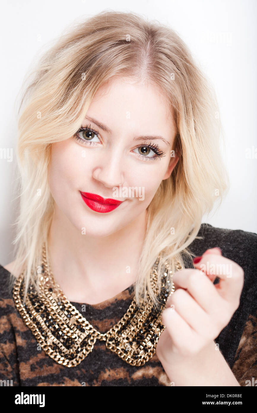 Portrait of a beautiful young fashionable blond woman Stock Photo - Alamy