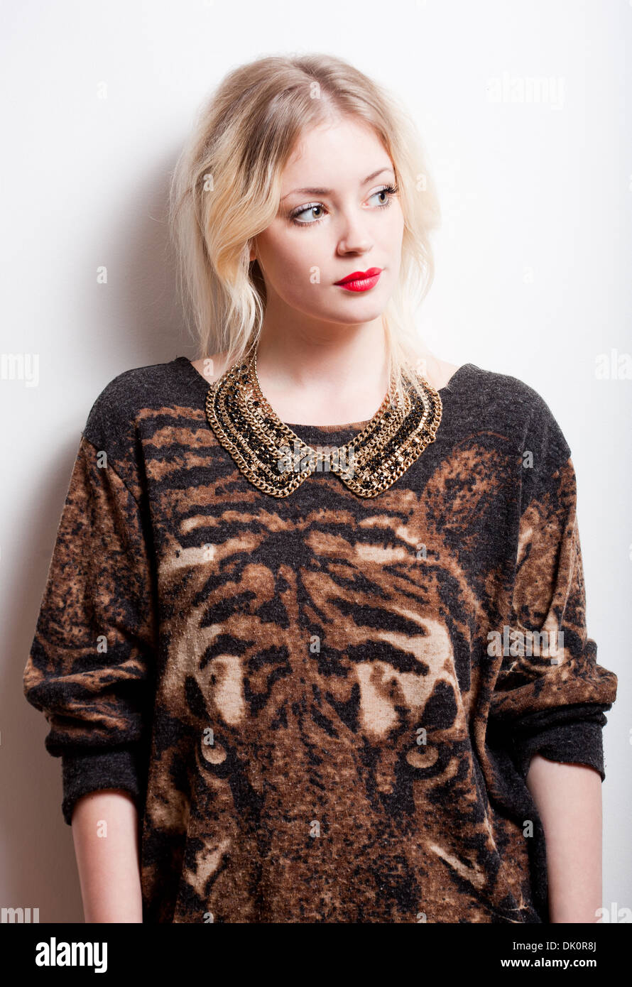 Portrait of a beautiful young fashionable blond woman Stock Photo - Alamy